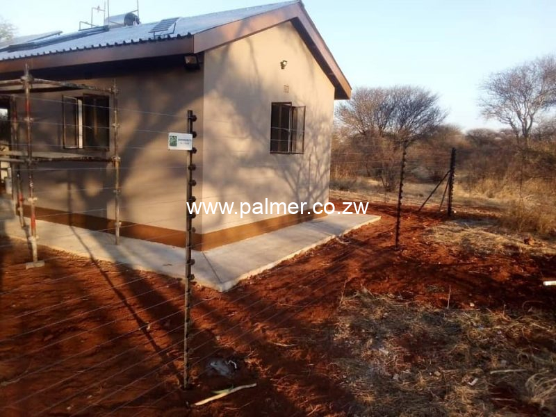 1.8m High Electric fence supply & fix Palmer Construction Zimbabwe